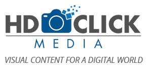 A blue and white logo for clic media